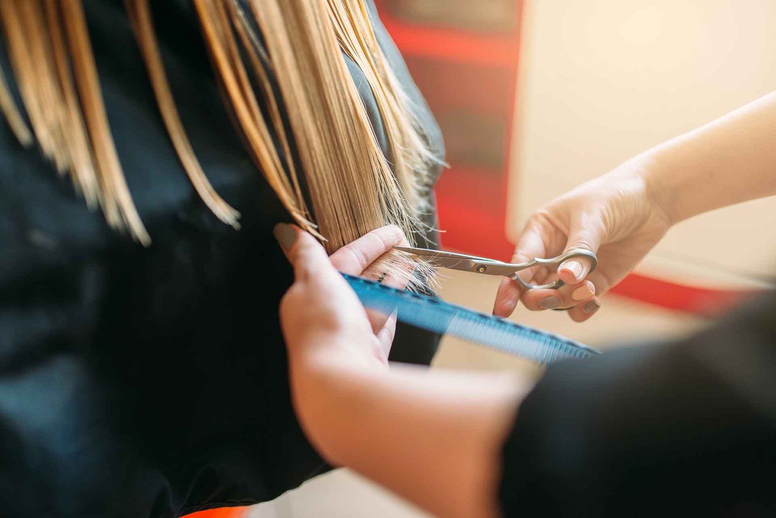 Top Hair Salon in Boca Raton | Makeup, Nails, Extensions – Serves Delray Beach, Parkland, Highland Beach & Lighthouse Point 24 hairdresser-with-scissors-in-hand-cuts-female-hair-