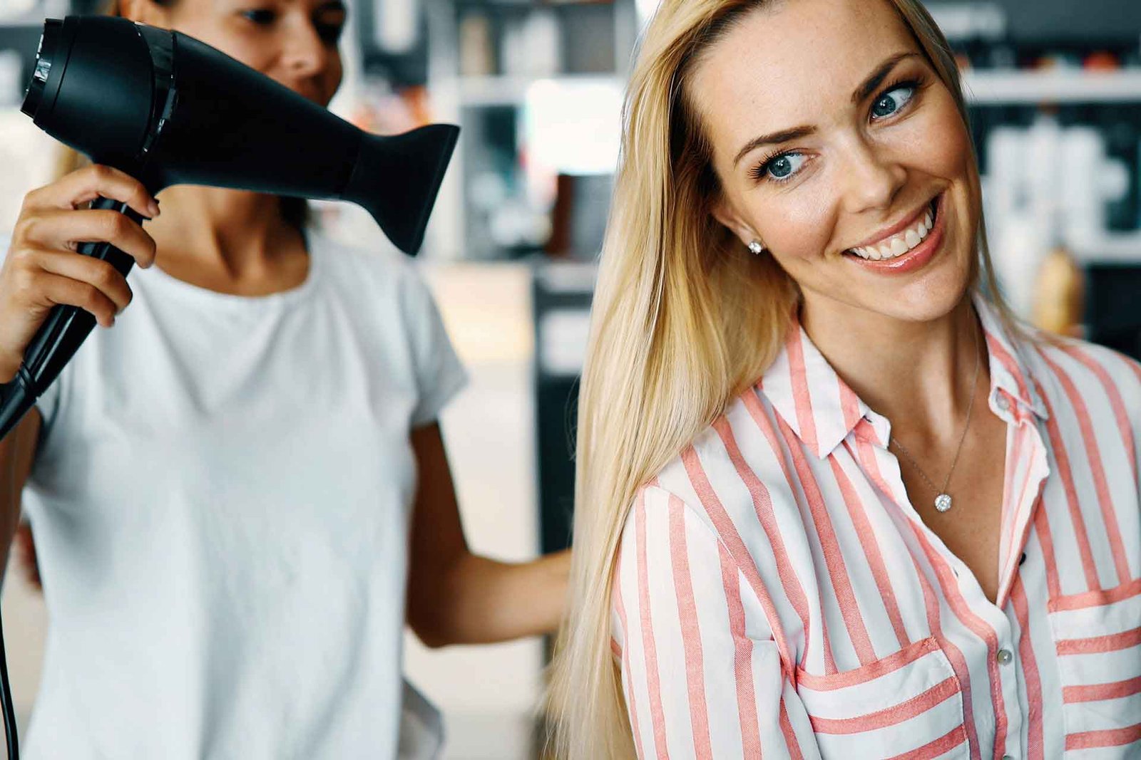 Top Hair Salon in Boca Raton | Makeup, Nails, Extensions – Serves Delray Beach, Parkland, Highland Beach & Lighthouse Point 23 happy-woman-at-the-hair-salon