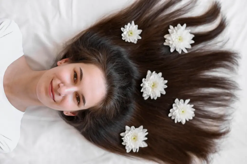 Organic Caviar Keratin Treatment 2 female with flowers hair Organic Caviar Keratin Treatment